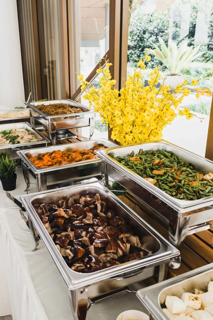 Catering trays in insulated warmers ready to serve in Singapore