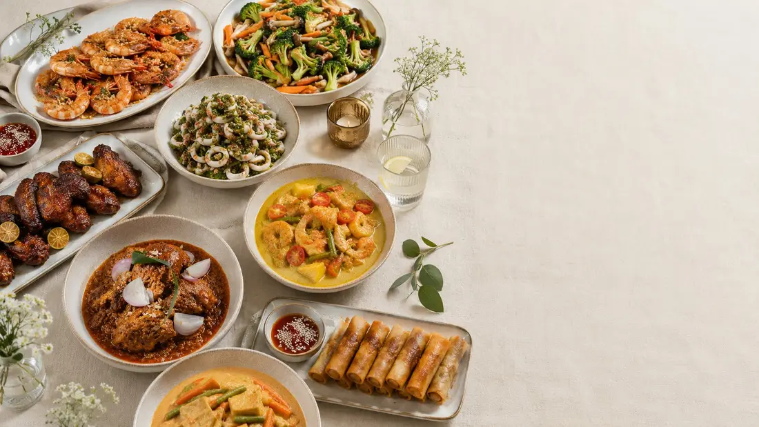 Catering spread set out for a group of twenty at an afternoon event in Singapore