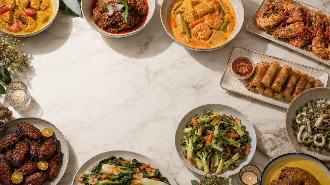 Small Christmas catering spread of local dishes for a family gathering in Singapore